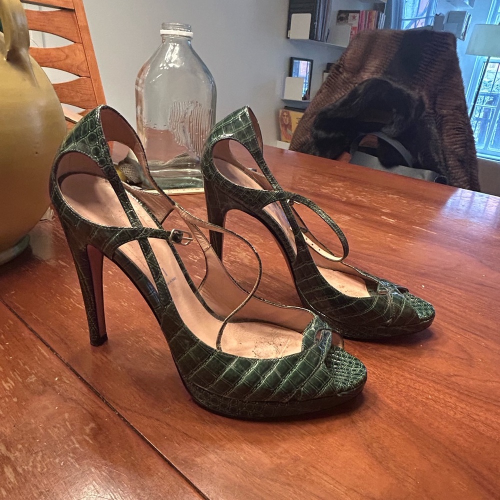 Casadei green leather snakeskin print heels.